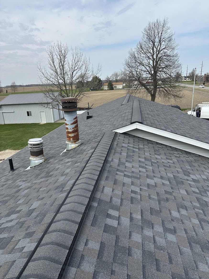 New shingles + reflashed vent stacks — Lambertville, MI