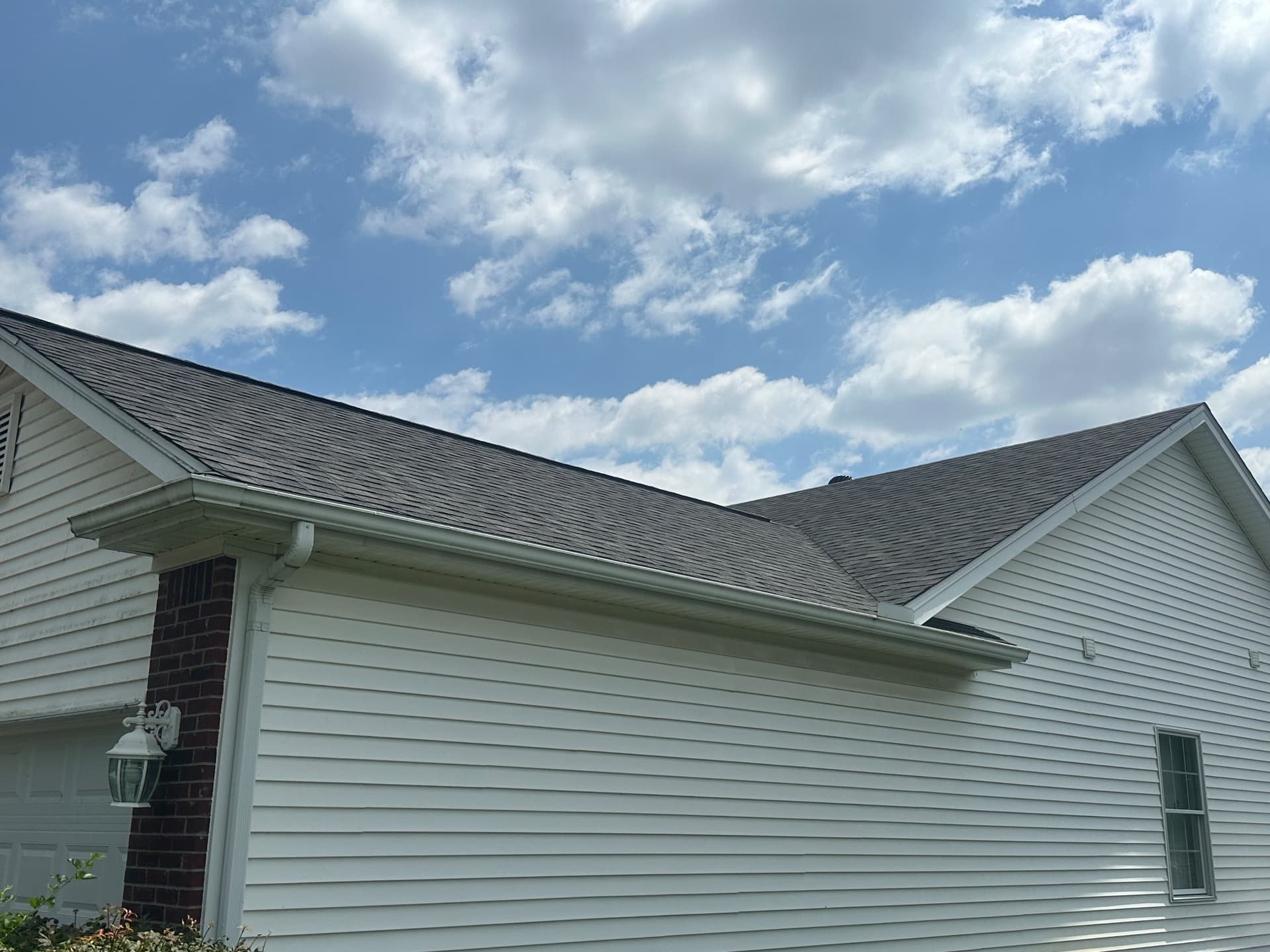 Clean hip and ridge lines after re-roof — Dundee, MI